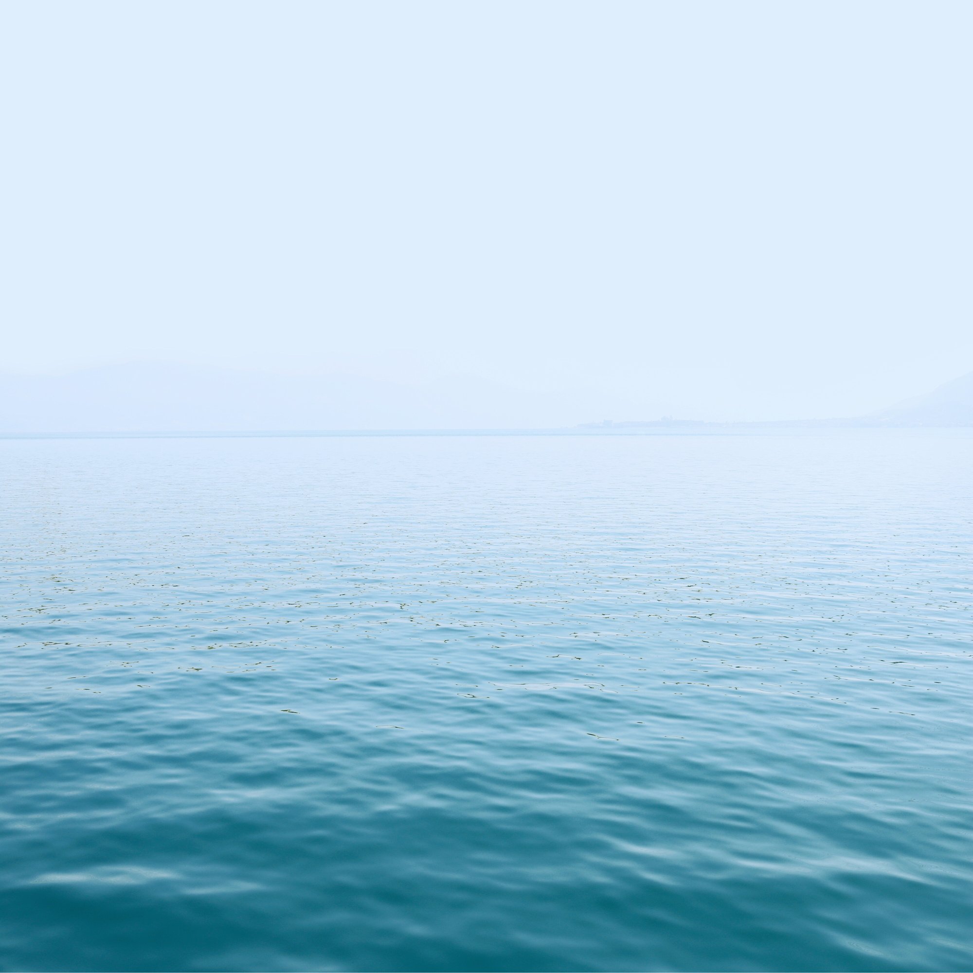 Scenic View of Calm Sea with Fog